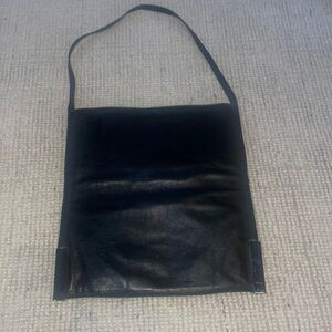 Gucci all leather crossbody black bag.  In mint condition.Rare Find!